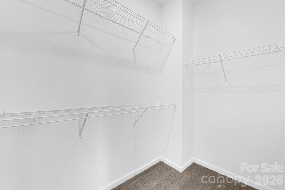 8668 Miles Gap Road Indian Land, SC 29707 - Photo 11 of 28 a view of a room with racks on the wall