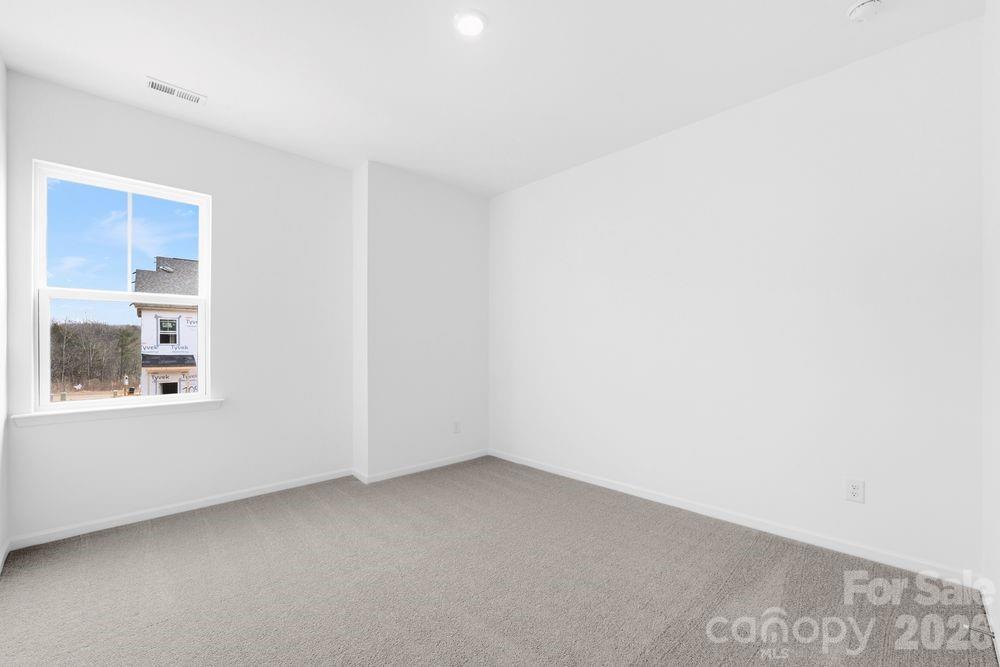 8668 Miles Gap Road Indian Land, SC 29707 - Photo 12 of 28 a view of an empty room with a window