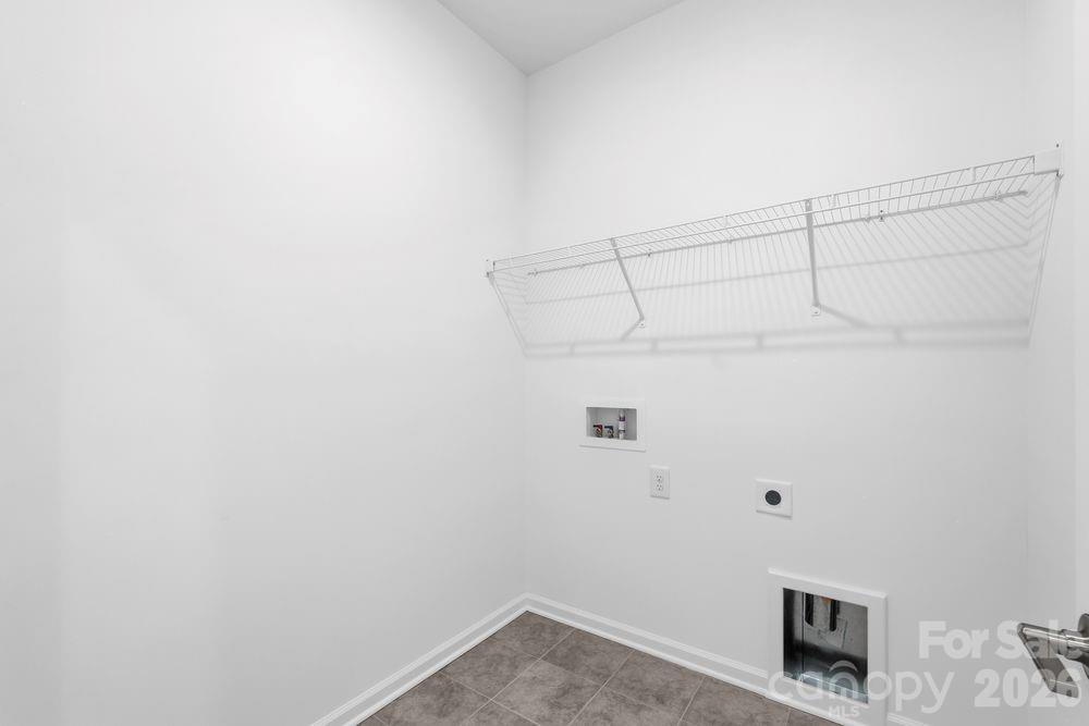 8668 Miles Gap Road Indian Land, SC 29707 - Photo 15 of 28 a view of a room with racks on the wall