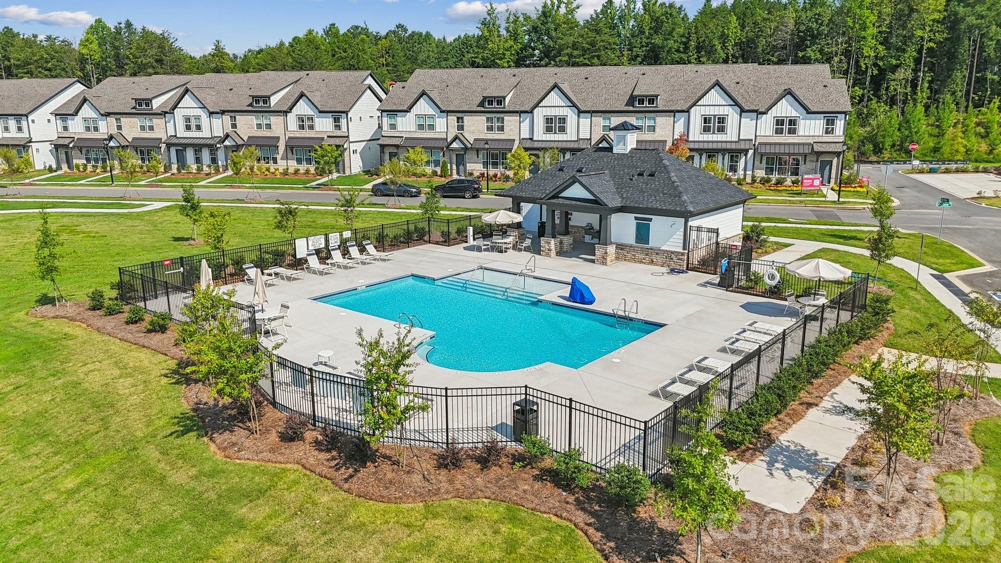8668 Miles Gap Road Indian Land, SC 29707 - Photo 24 of 28 an aerial view of a house with swimming pool garden and patio