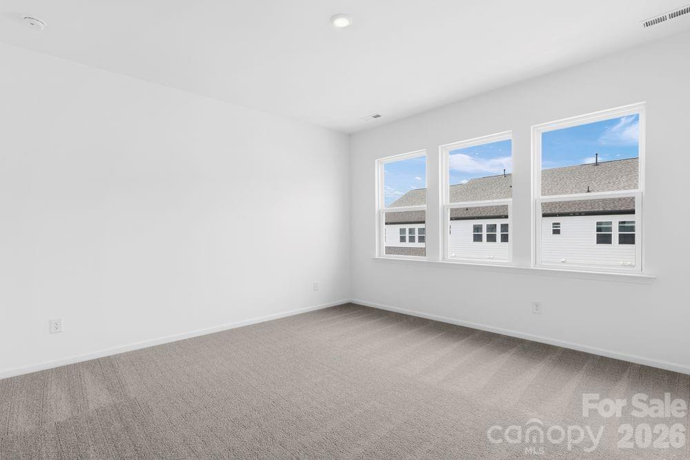 8668 Miles Gap Road Indian Land, SC 29707 - Photo 9 of 28 a view of an empty room with a window