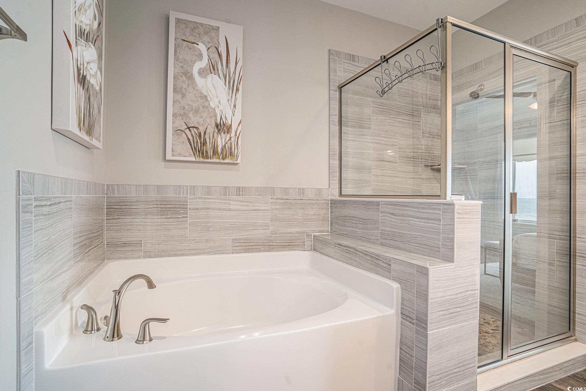 1907 South Waccamaw Drive Murrells Inlet, SC 29576 - Photo 19 of 40 Bathroom featuring separate shower and tub