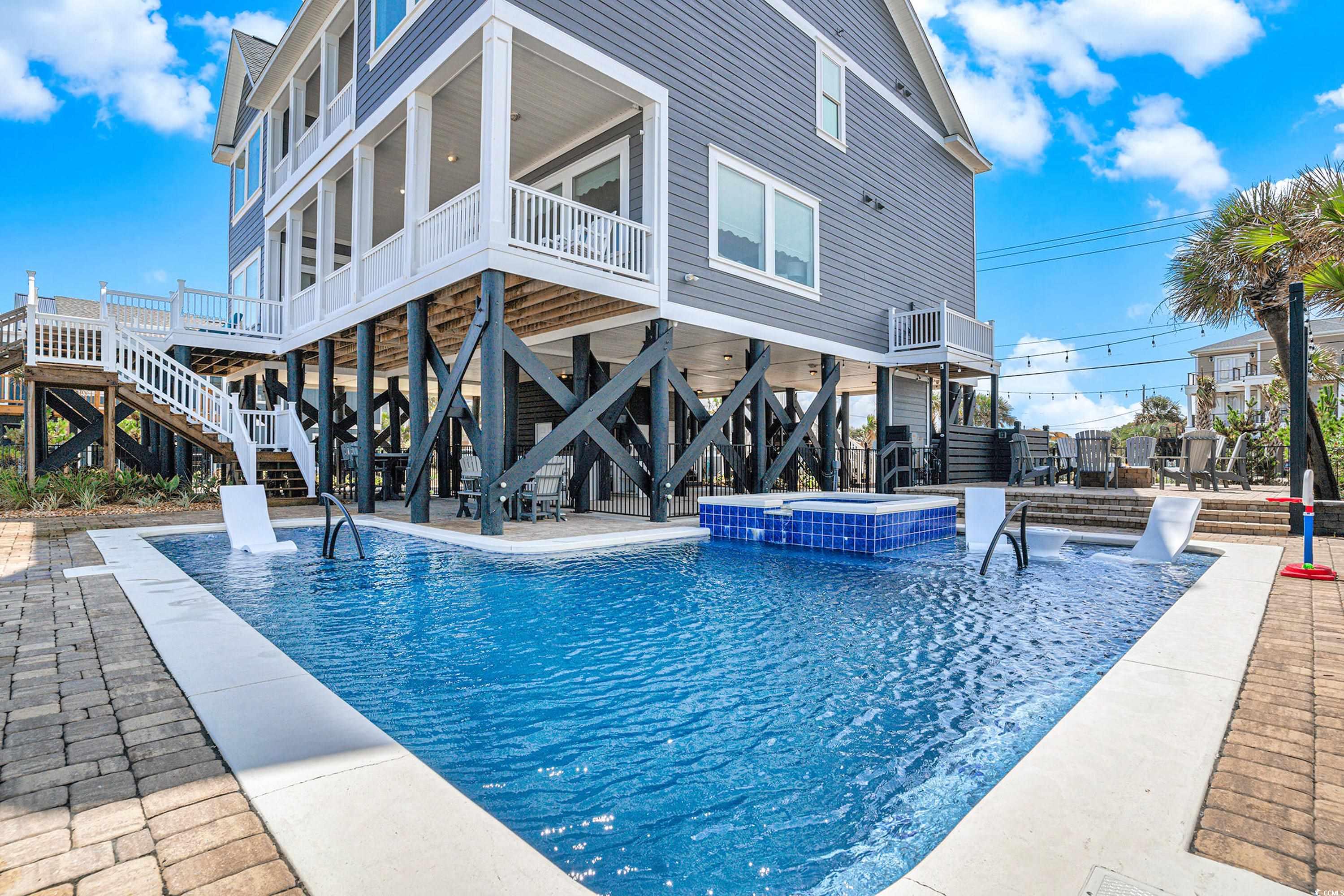 1907 South Waccamaw Drive Murrells Inlet, SC 29576 - Photo 6 of 40 Private pool with professionally landscaped pool deck