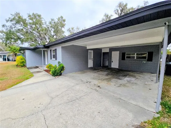a view of a house with a garage