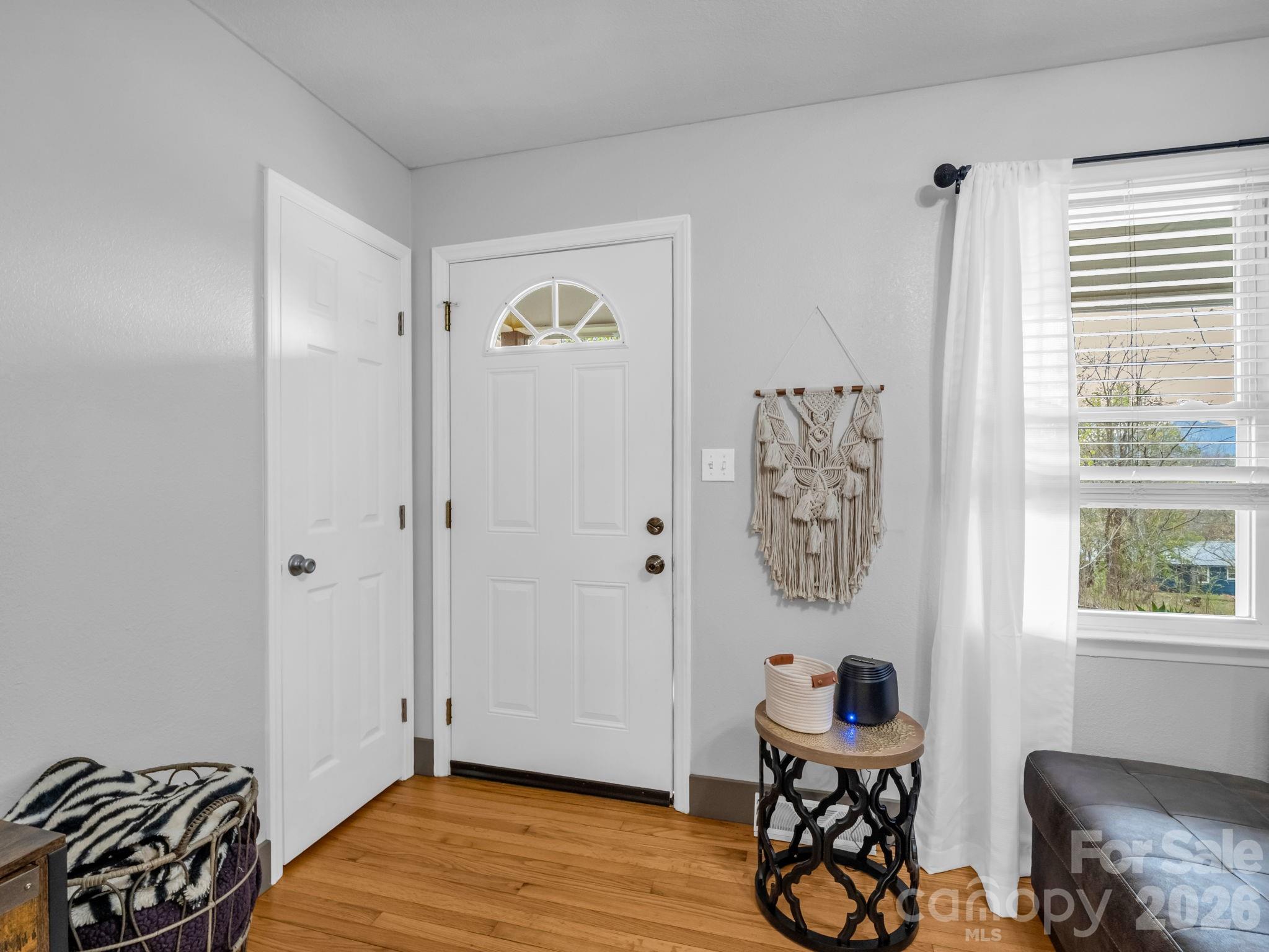 248 Bible School Road Lake Lure, NC 28746 - Photo 11 of 38 a view of room with furniture and windows