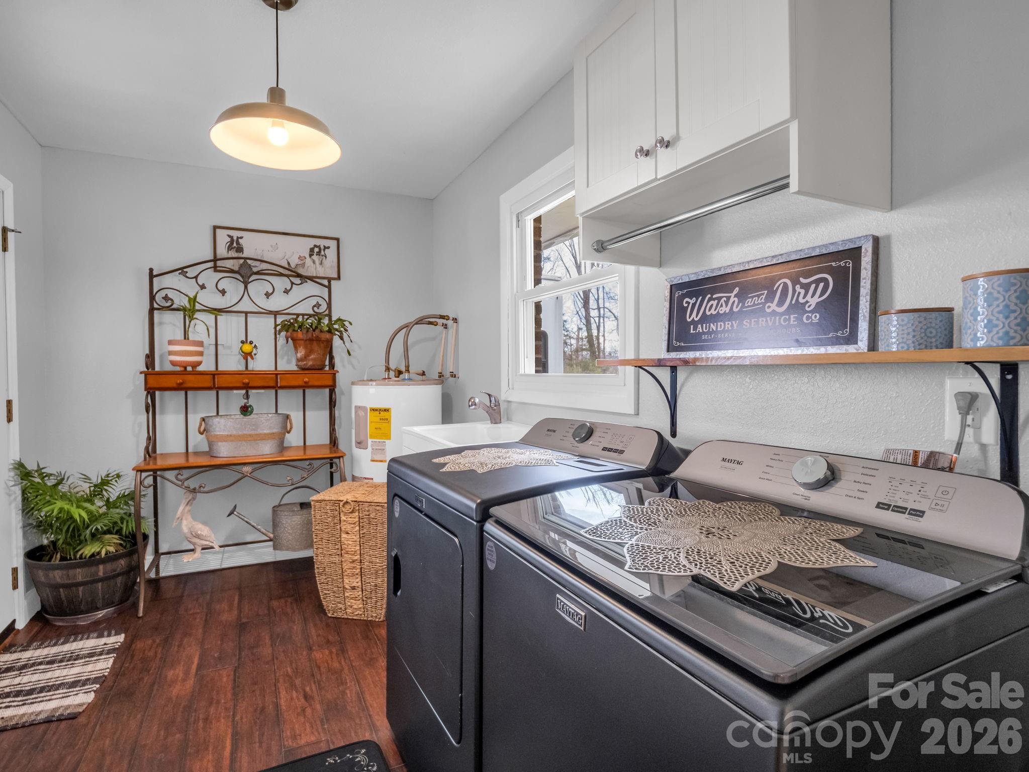 248 Bible School Road Lake Lure, NC 28746 - Photo 22 of 38 a kitchen that has a lot of cabinets in it