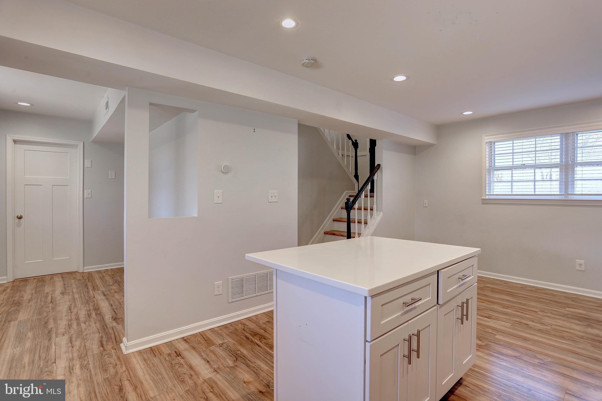 800 A Barrett Avenue Arnold, MD 21012 - Photo 12 of 30 a kitchen that has a sink and a stove in it