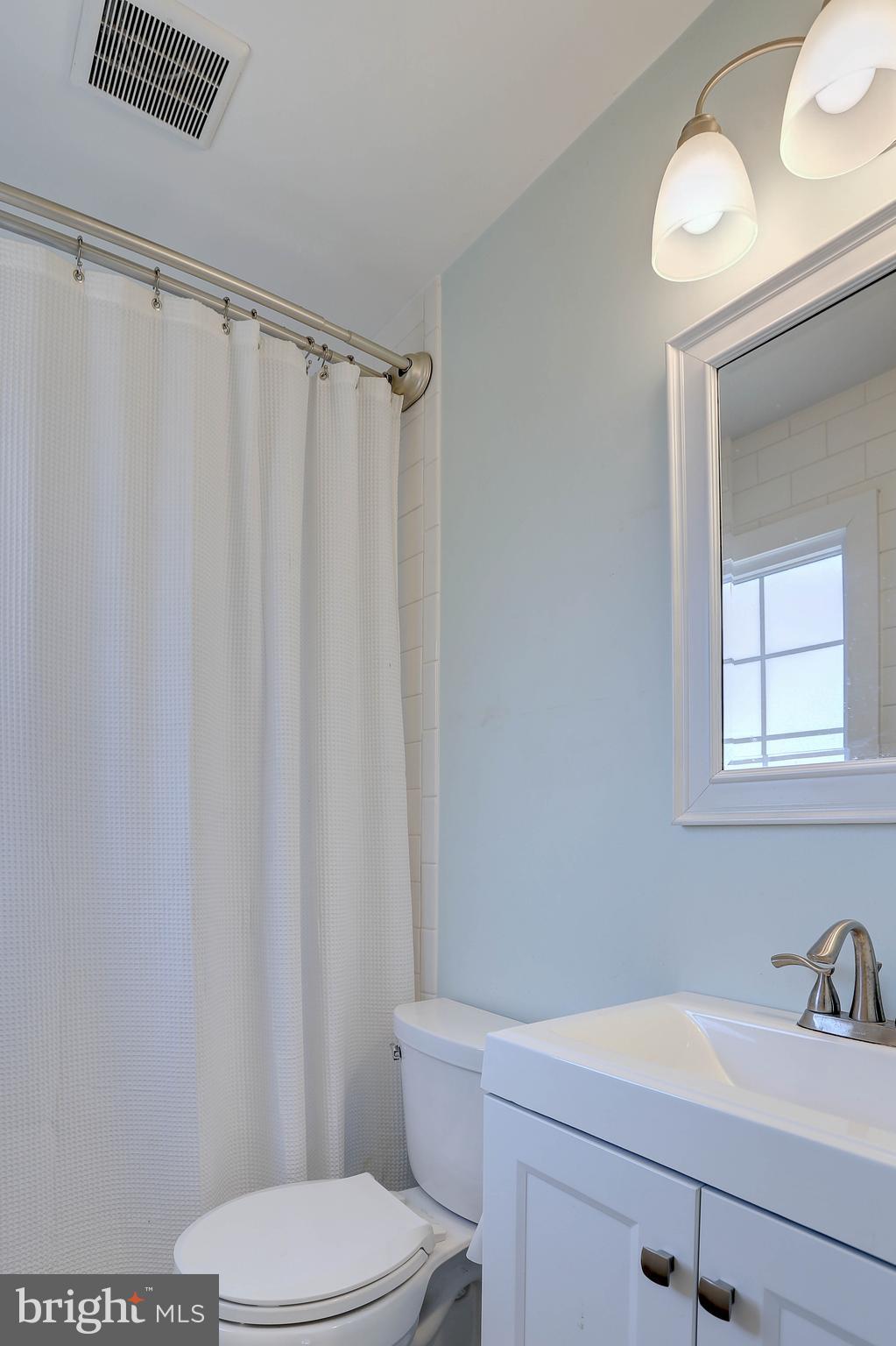 800 A Barrett Avenue Arnold, MD 21012 - Photo 20 of 30 a bathroom with a sink toilet and shower