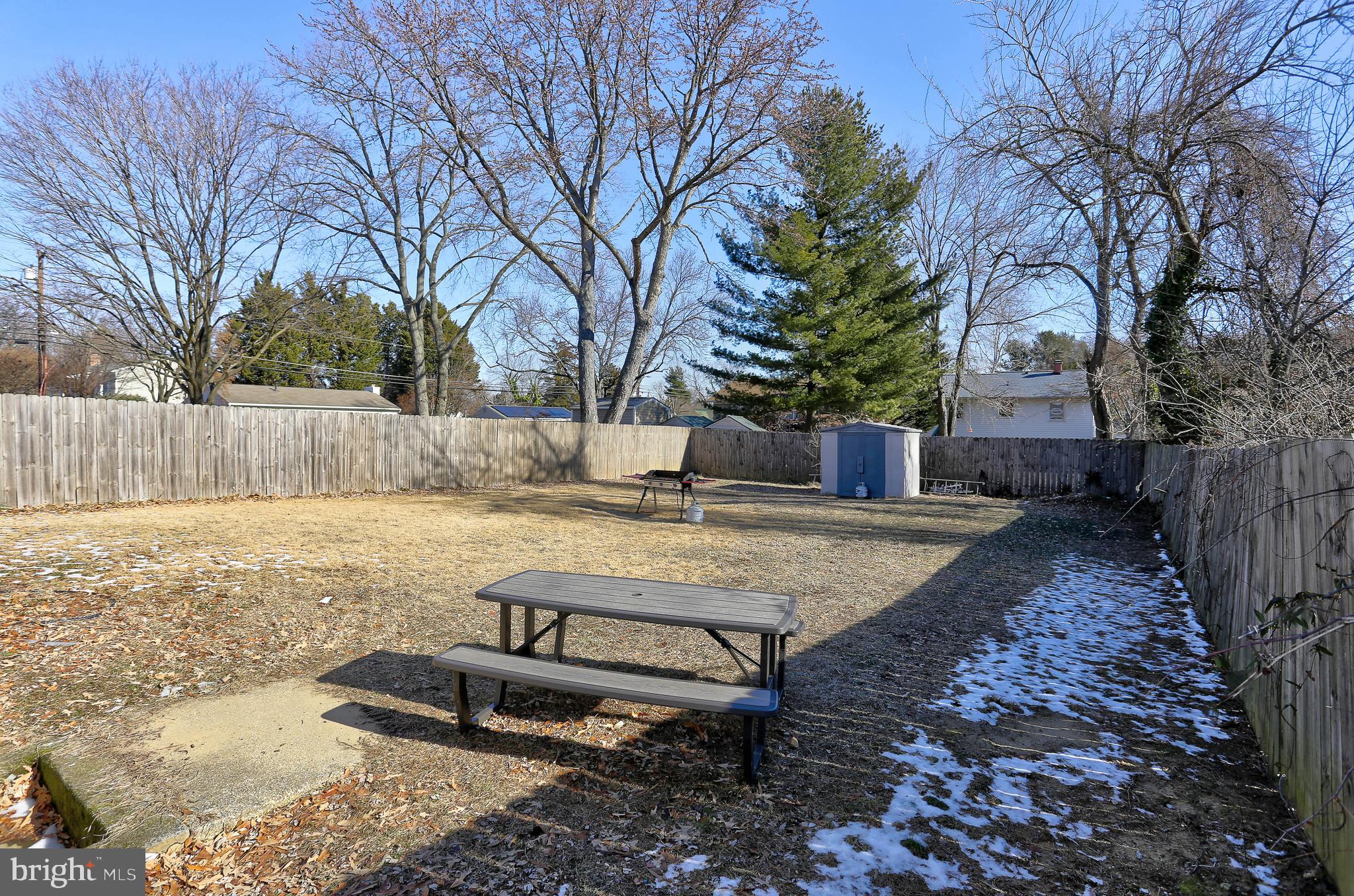 800 A Barrett Avenue Arnold, MD 21012 - Photo 27 of 30 a view of a backyard with snow on the tree