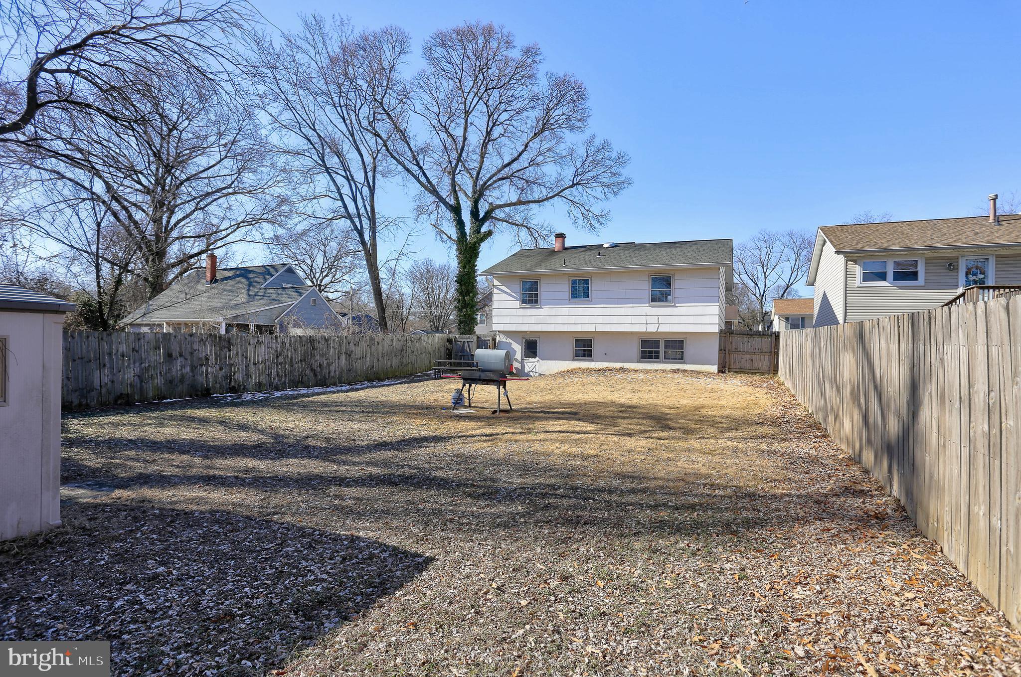800 A Barrett Avenue Arnold, MD 21012 - Photo 30 of 30 a view of a house with a yard covered in snow