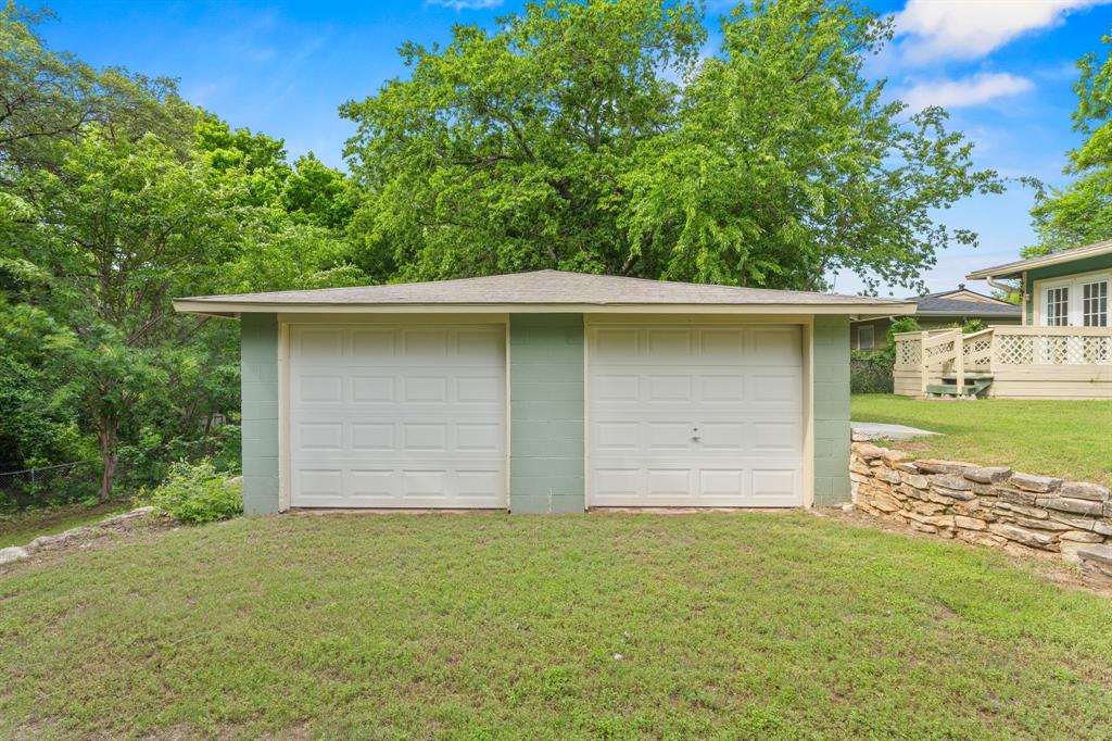 1236 South Brazos Street Weatherford, TX 76086 - Photo 22 of 25 Detached, oversized two car garage with electricity