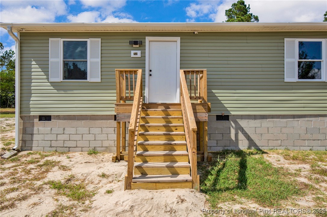 258 Brower Road Cameron, NC 28326 - Photo 22 of 24 a view of a house with a yard