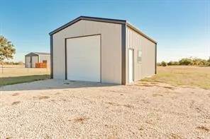 a view of backyard of a house
