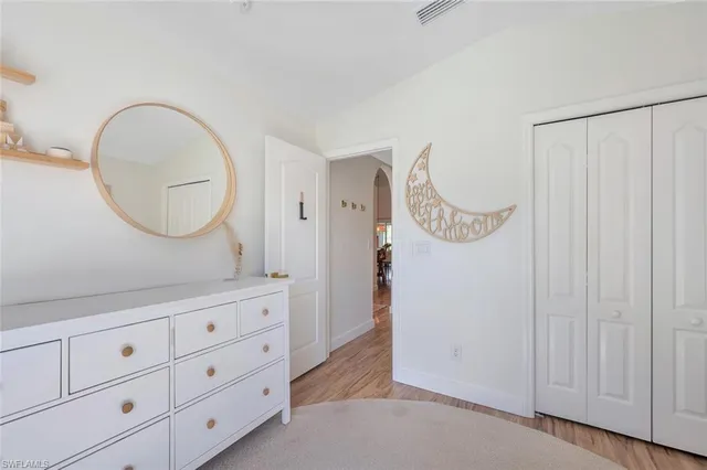a bathroom with a sink a mirror and a shower