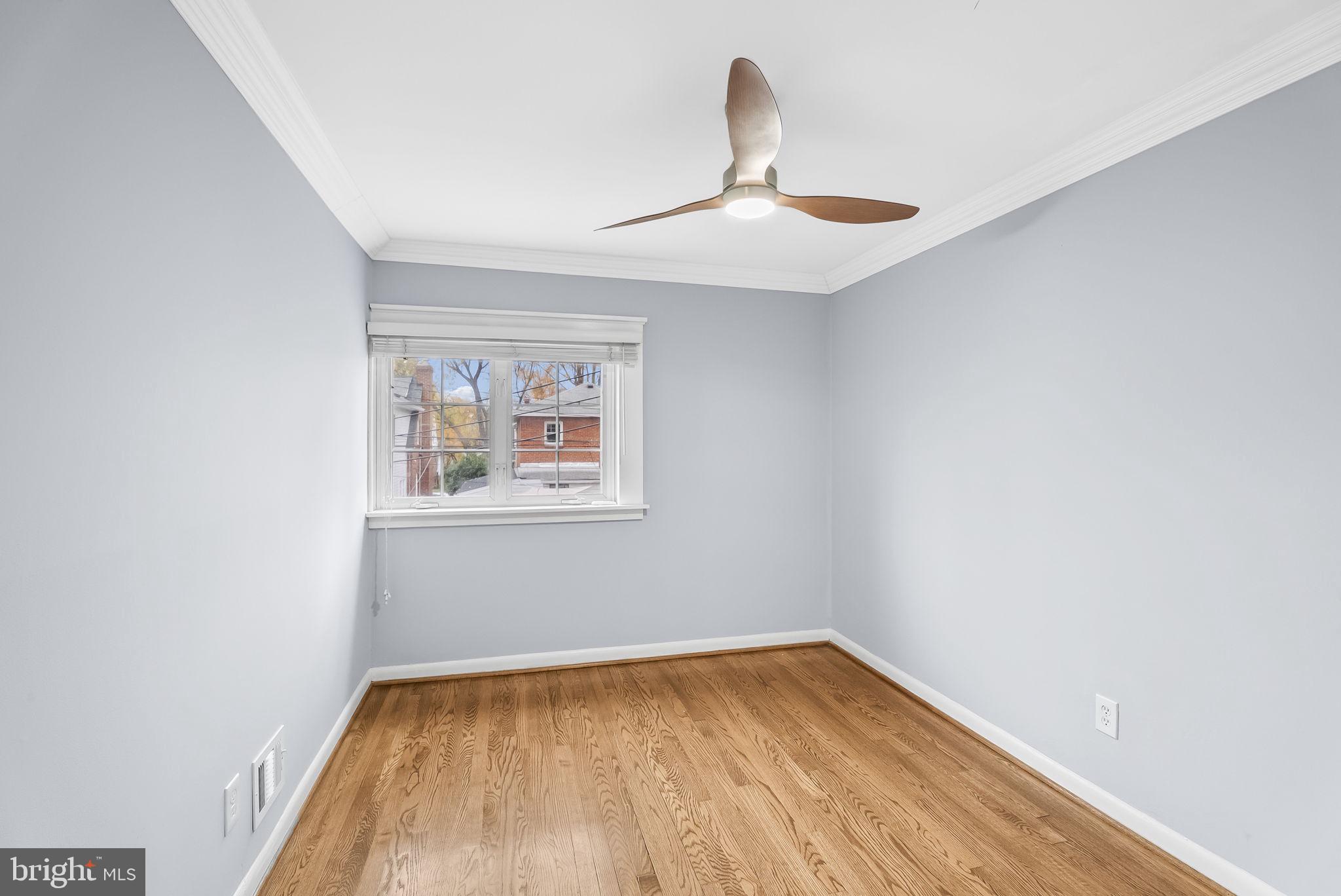 433 Earl Street Alexandria, VA 22314 - Photo 16 of 30 wooden floor in an empty room with a window
