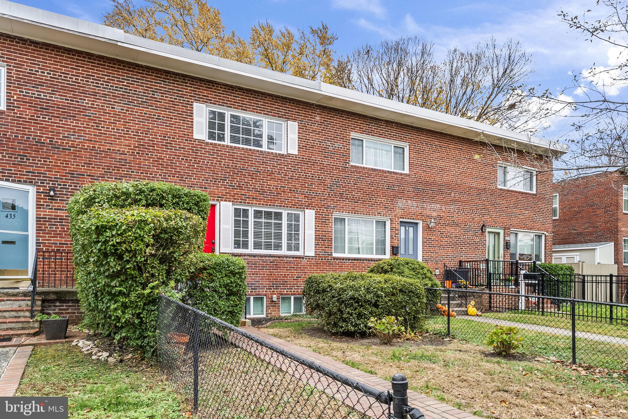 433 Earl Street Alexandria, VA 22314 - Photo 3 of 30 a front view of a house with garden