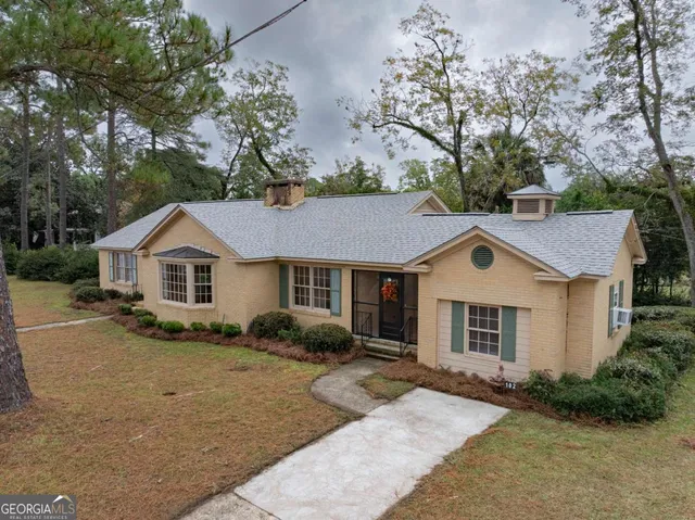 a house view with a garden space