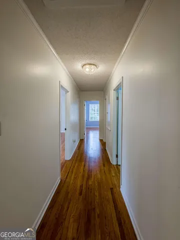 a bathroom with a sink a mirror and a shower