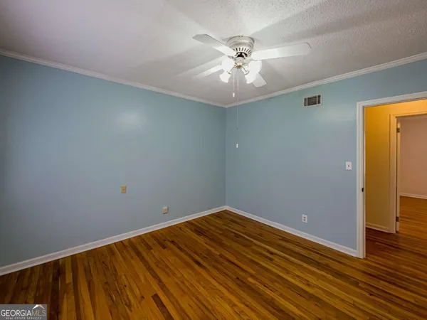 a bathroom with a toilet and a sink