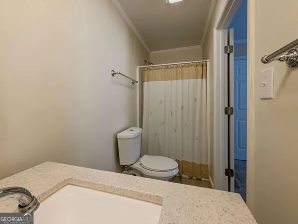 an aerial view of house with yard