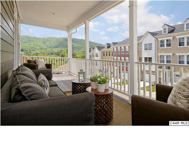 2068 Avinity Loop Charlottesville, VA 22902 - Photo 4 of 16 a living room with furniture and a floor to ceiling window