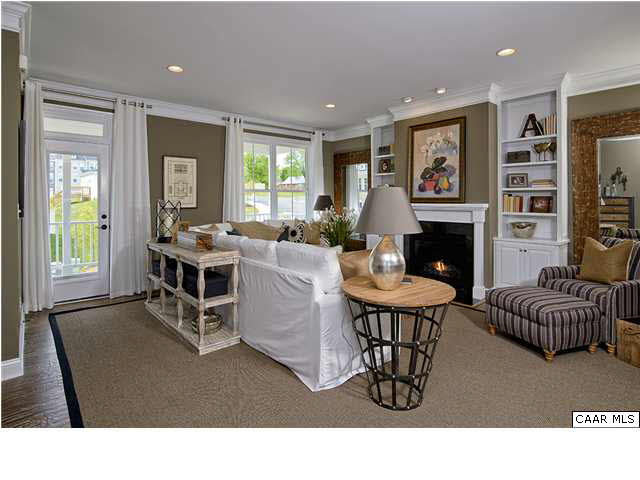 2068 Avinity Loop Charlottesville, VA 22902 - Photo 7 of 16 a living room with furniture a window and a fireplace