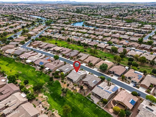 an aerial view of a city with lots of residential buildings