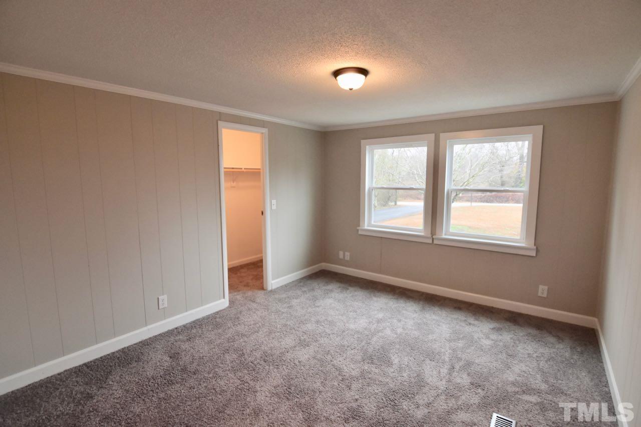 10110 Timothy Road Dunn, NC 28334 - Photo 34 of 41 an empty room with windows