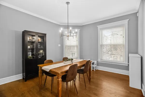 a kitchen with a refrigerator a stove top oven and kitchen island
