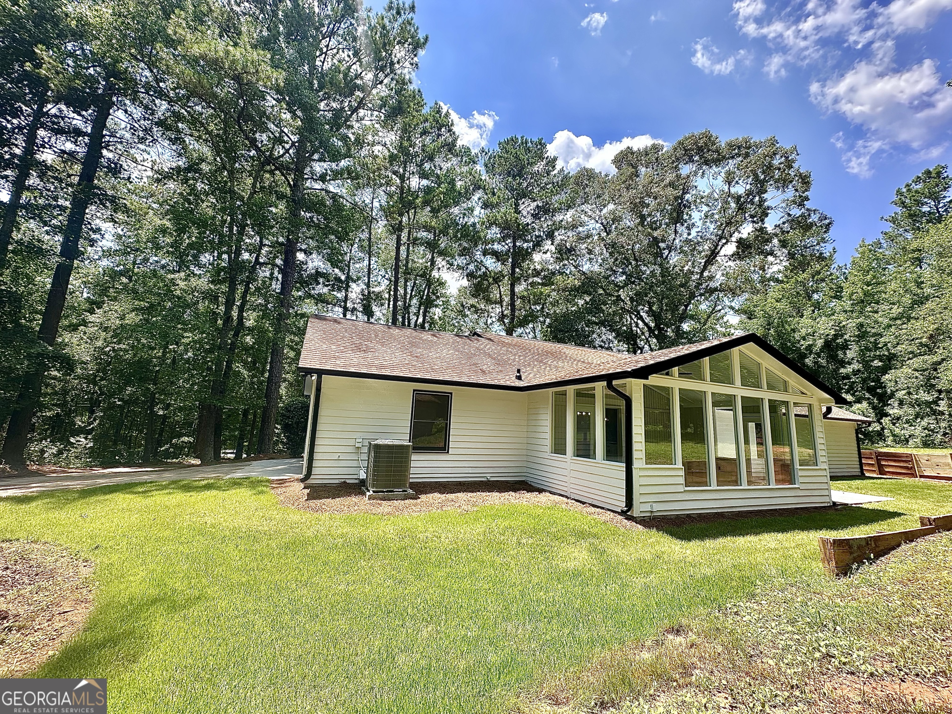 115 Creekside Lane Covington, GA 30016 - Photo 11 of 59 a view of a house with swimming pool and porch