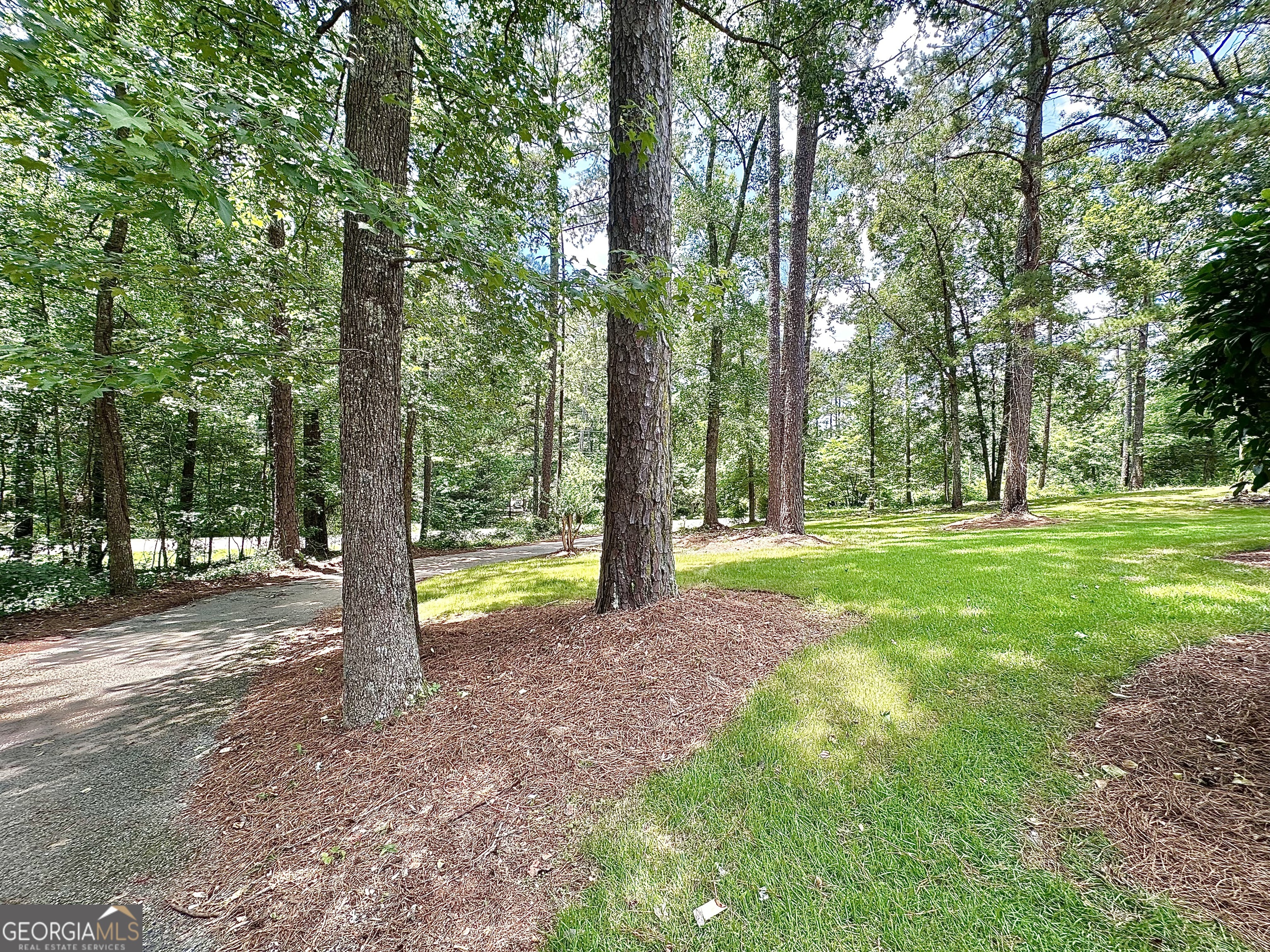115 Creekside Lane Covington, GA 30016 - Photo 22 of 59 a view of a yard with swimming pool and sitting area
