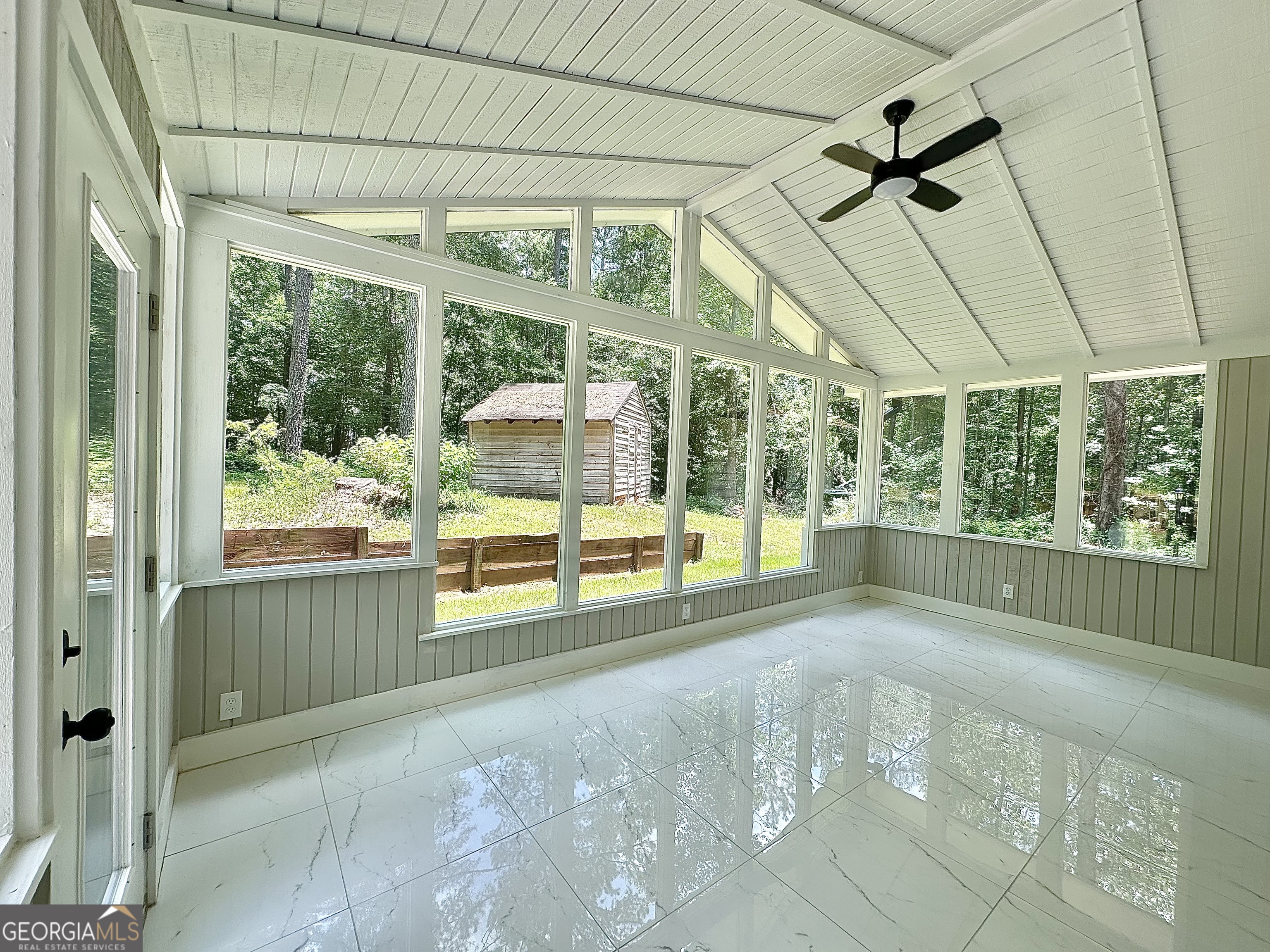 115 Creekside Lane Covington, GA 30016 - Photo 46 of 59 a view of an empty room with a balcony
