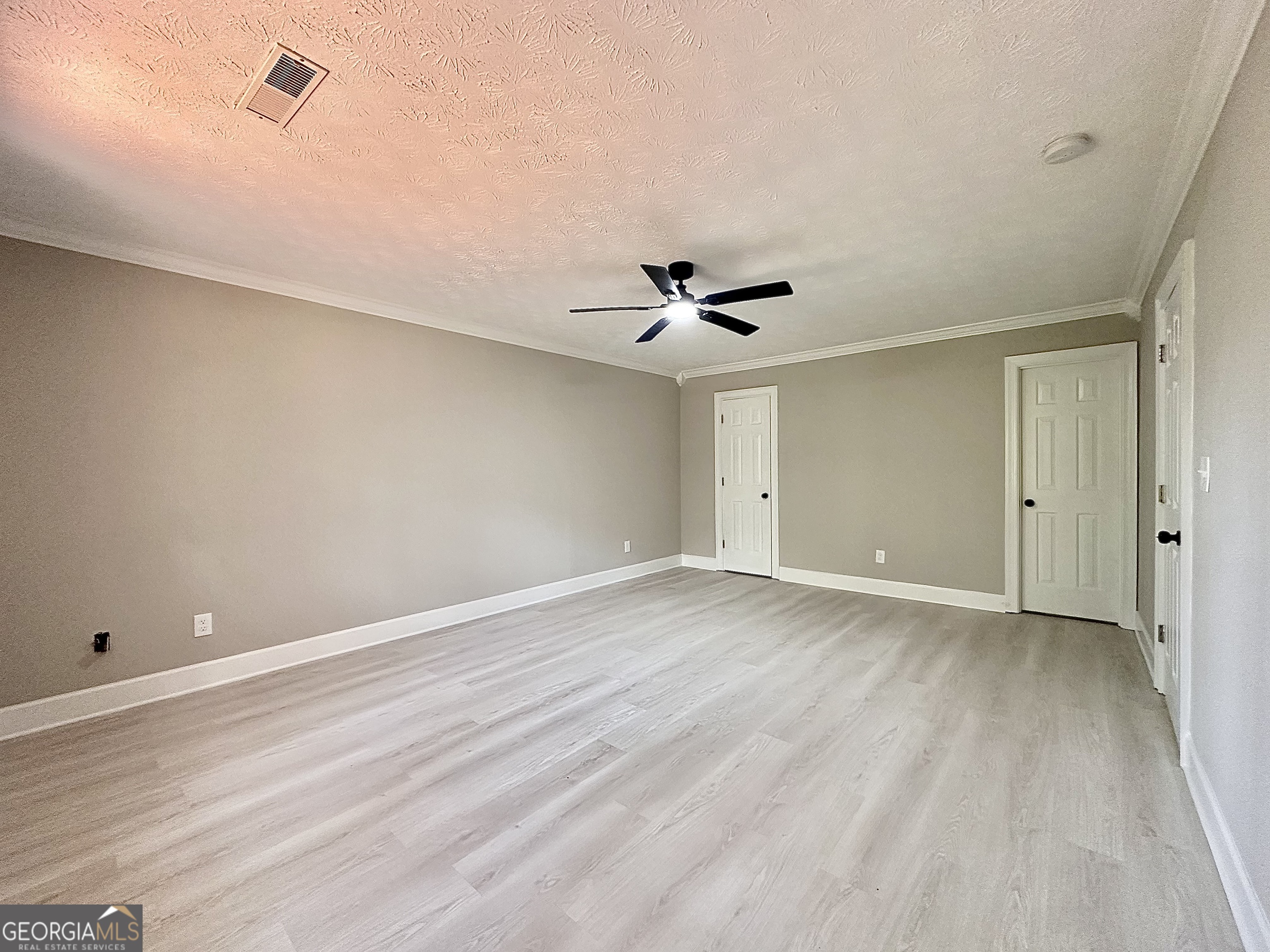 115 Creekside Lane Covington, GA 30016 - Photo 48 of 59 a view of an empty room