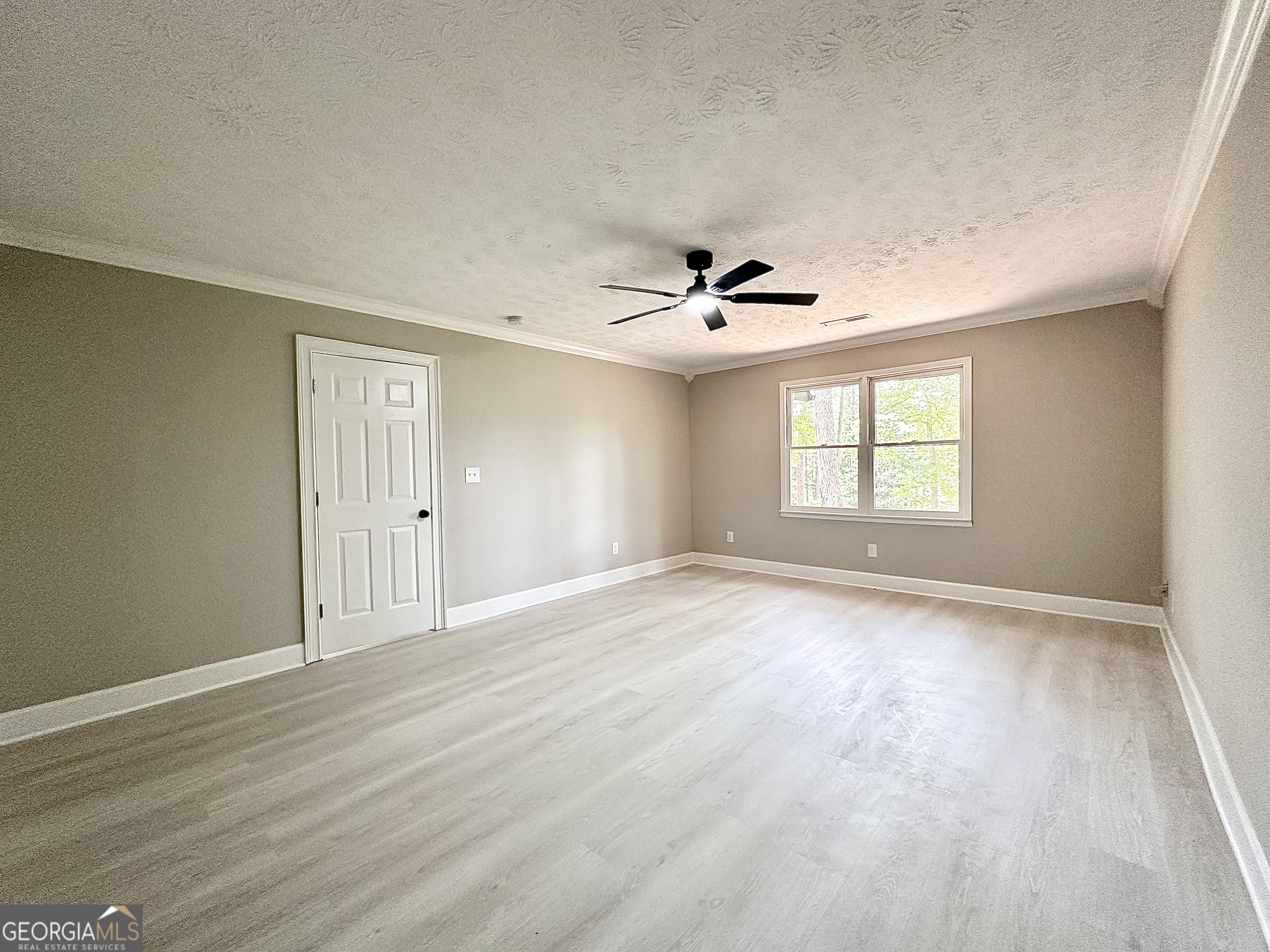 115 Creekside Lane Covington, GA 30016 - Photo 49 of 59 a view of an empty room with a window