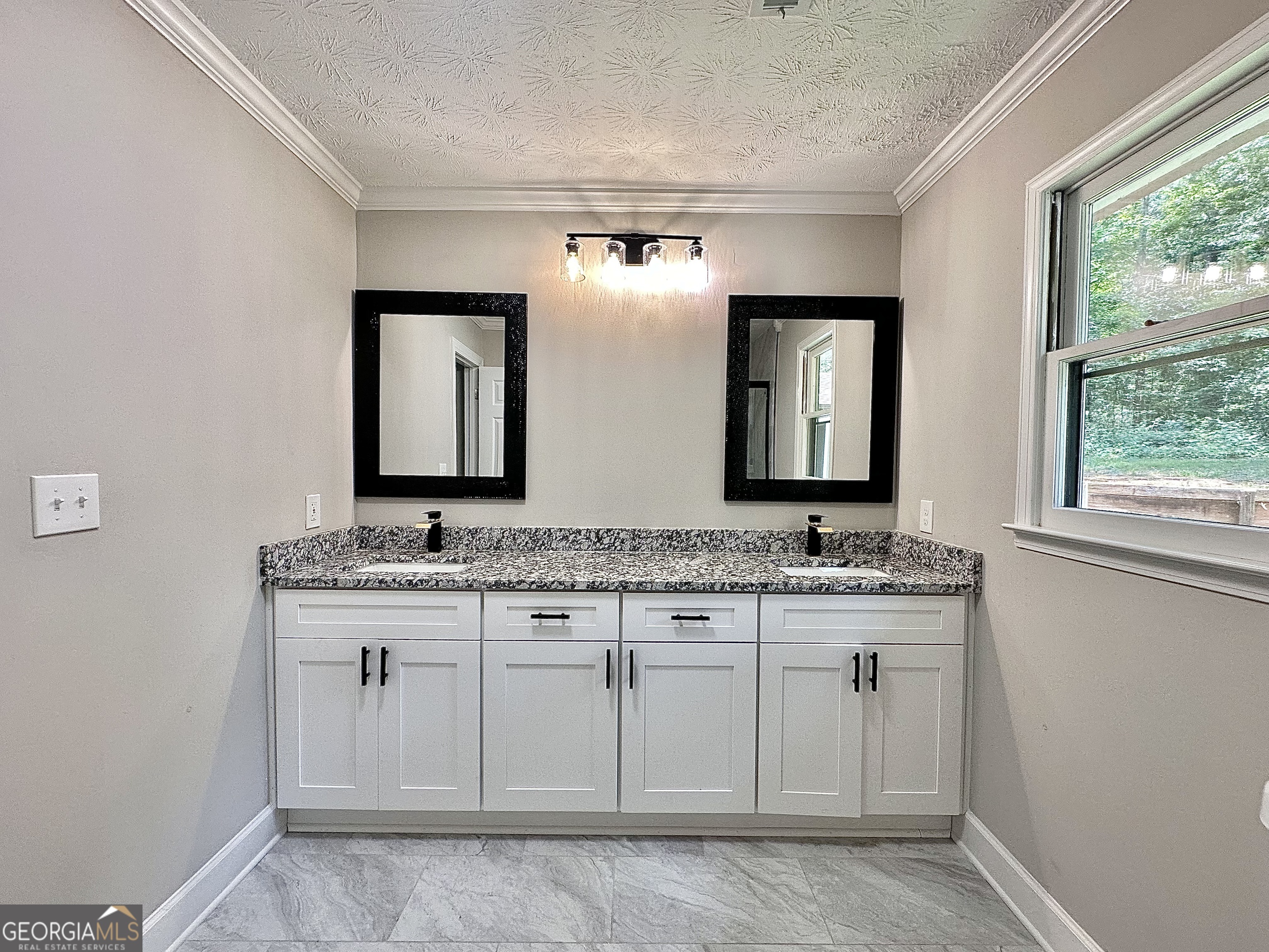 115 Creekside Lane Covington, GA 30016 - Photo 52 of 59 a bathroom with a toilet sink and mirror