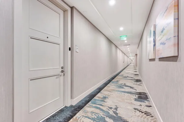 a kitchen with granite countertop cabinets stainless steel appliances and counter space