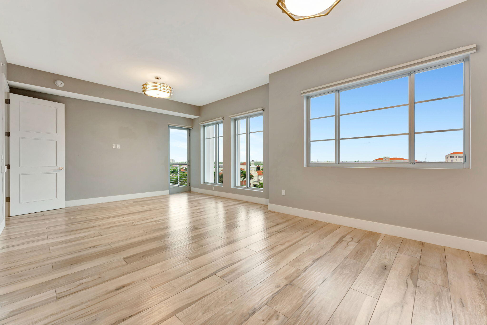 155 East Boca Raton Road, Unit 719 Boca Raton, FL 33432 - Photo 25 of 102 wooden floor in an empty room with a window