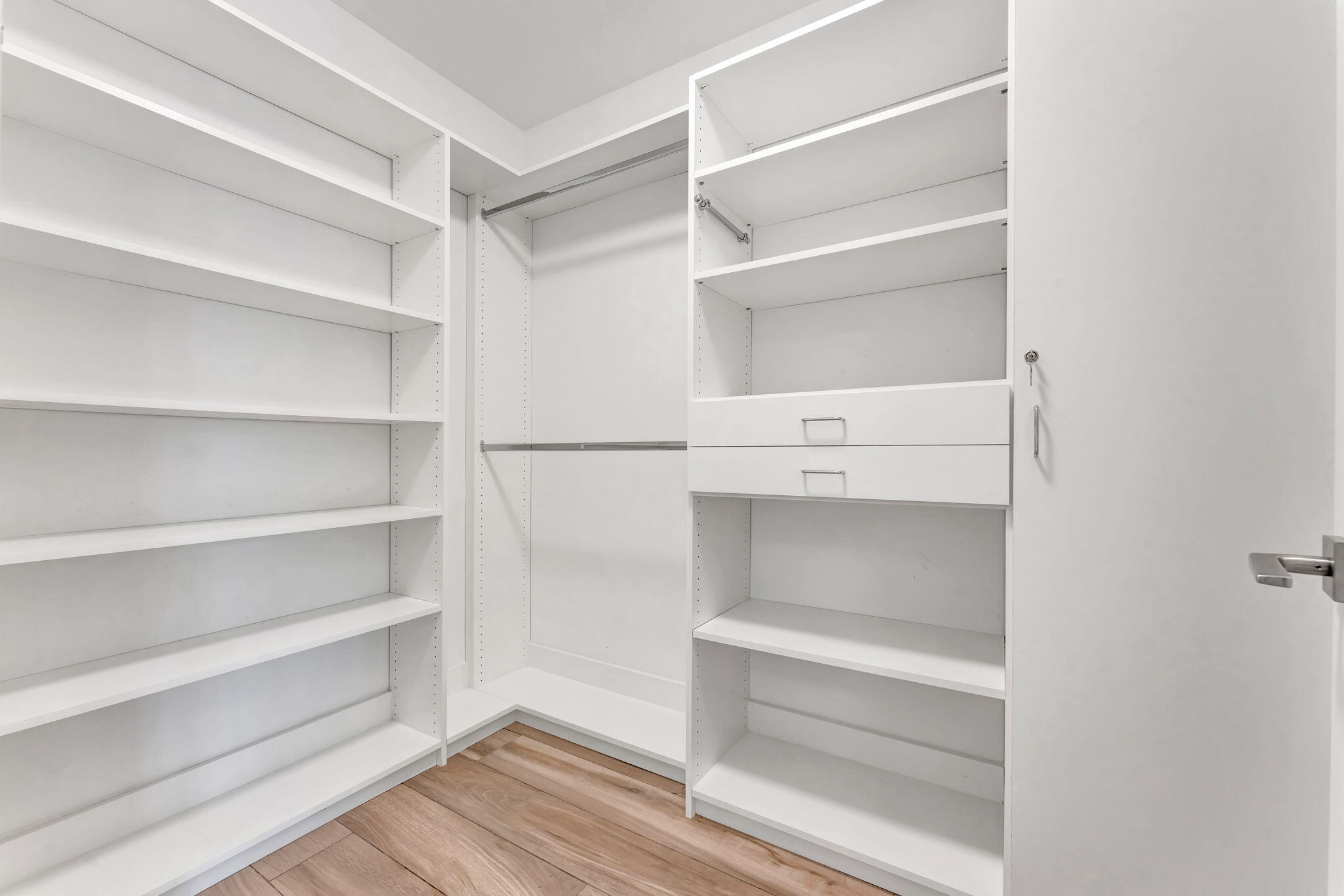 155 East Boca Raton Road, Unit 719 Boca Raton, FL 33432 - Photo 33 of 102 a view of walk in closet with empty racks