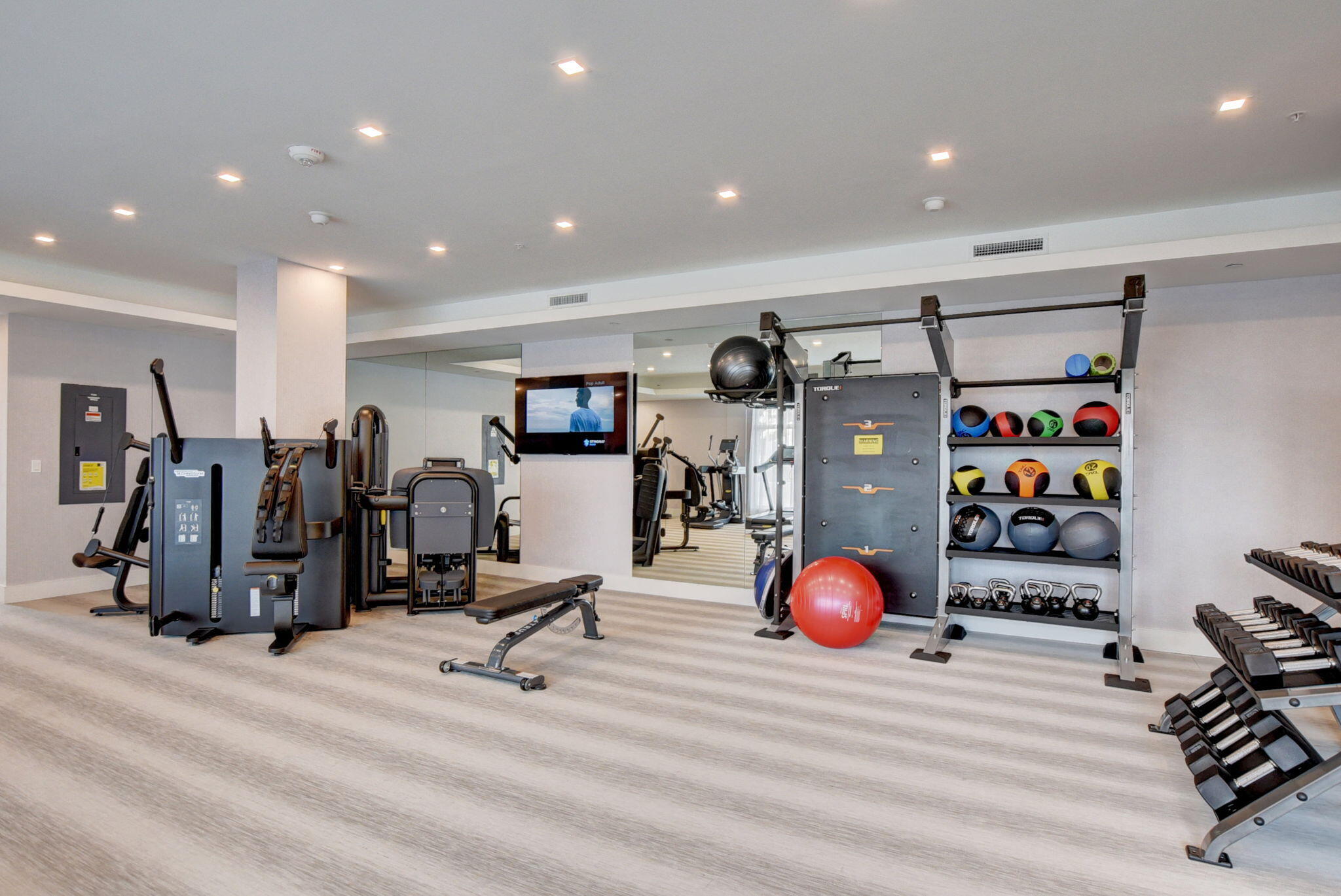 155 East Boca Raton Road, Unit 719 Boca Raton, FL 33432 - Photo 91 of 102 a view of a room with gym equipment