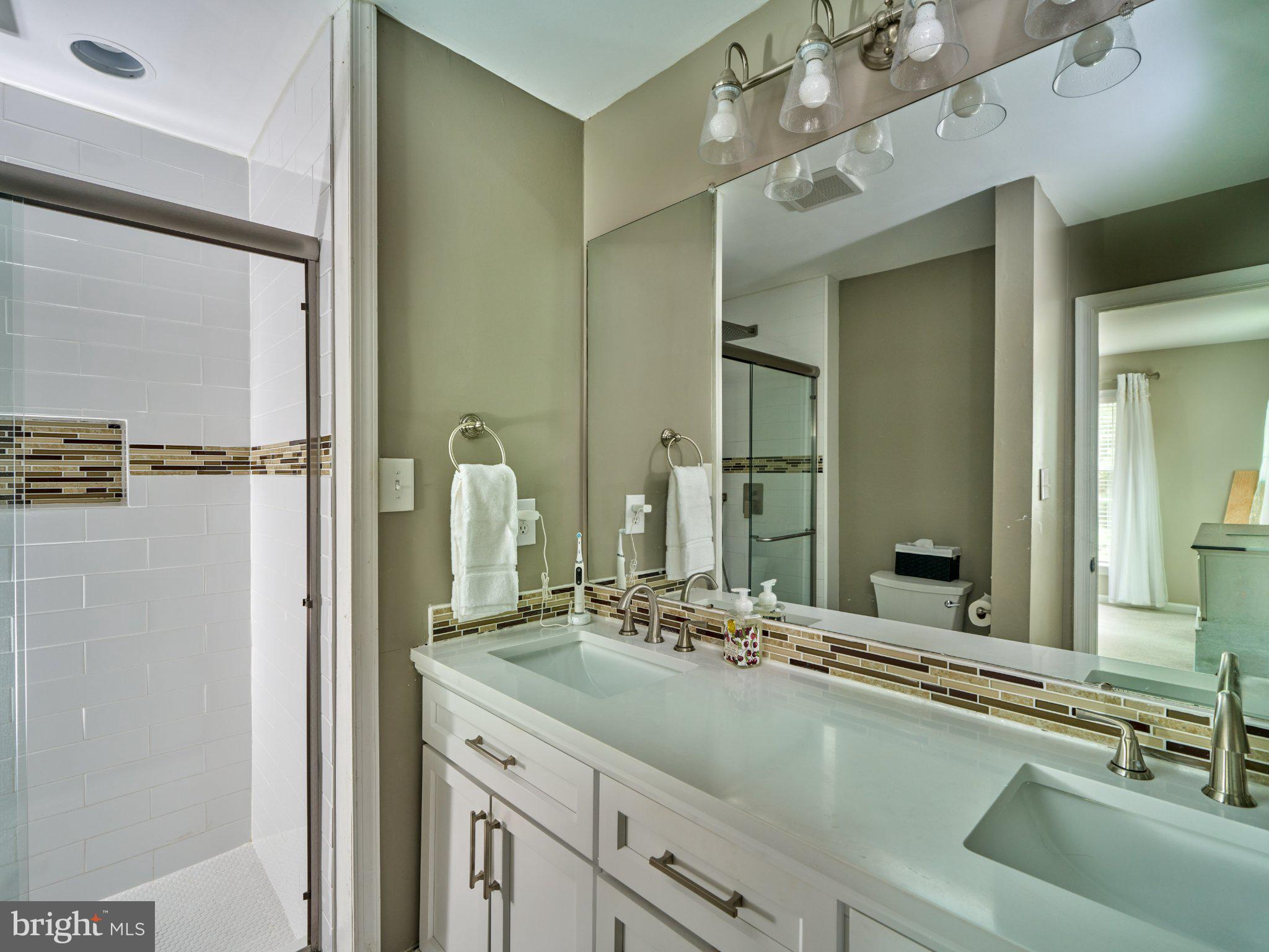 27 Sentinel Road, Unit 139 Washington Crossing, PA 18977 - Photo 18 of 37 Elegant bathroom with modern finishes.