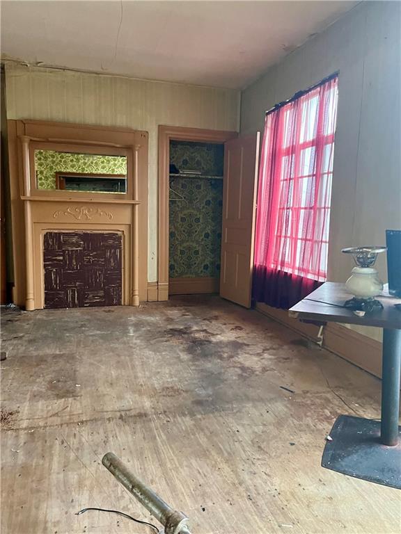 1024 Chartiers Avenue McKees Rocks, PA 15136 - Photo 12 of 25 a view of an empty room with a fireplace and a window