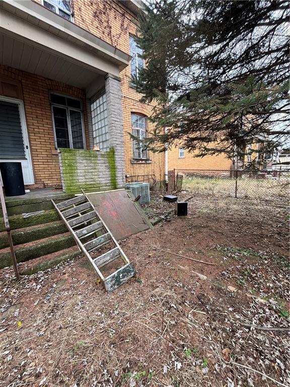 1024 Chartiers Avenue McKees Rocks, PA 15136 - Photo 17 of 25 a backyard of a house with barbeque oven