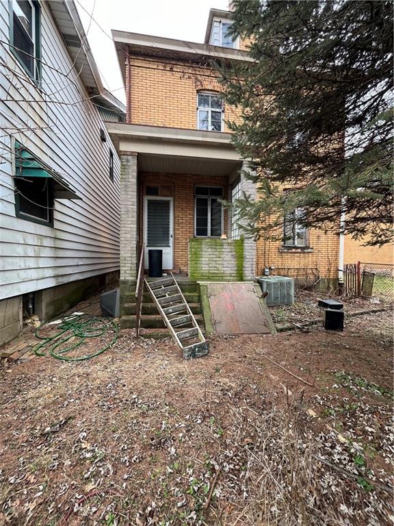 1024 Chartiers Avenue McKees Rocks, PA 15136 - Photo 2 of 25 a view of a house with a backyard and sitting area