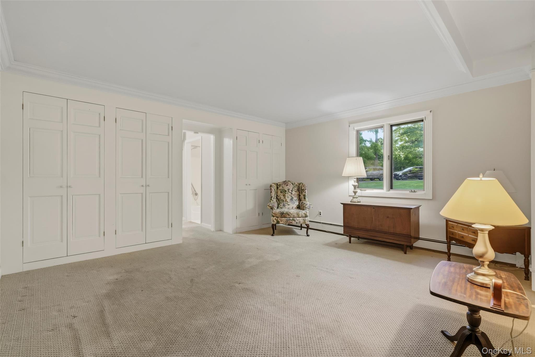 31 Pines Bridge Road Amawalk, NY 10501 - Photo 11 of 29 The primary bedroom offers built-in closets and a dressing area.