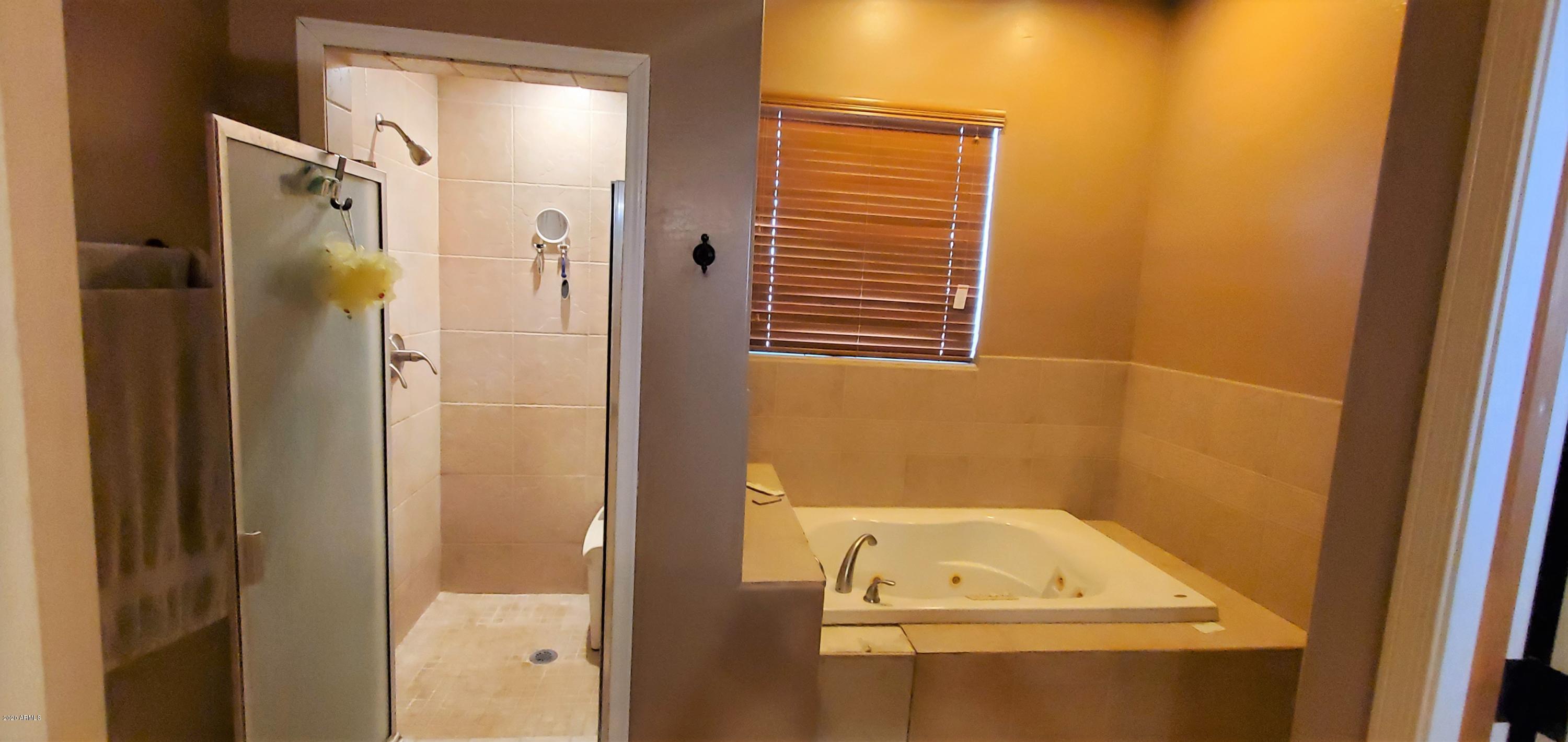 13001 South Tuthill Road Buckeye, AZ 85326 - Photo 11 of 29 Master Tub & Shower