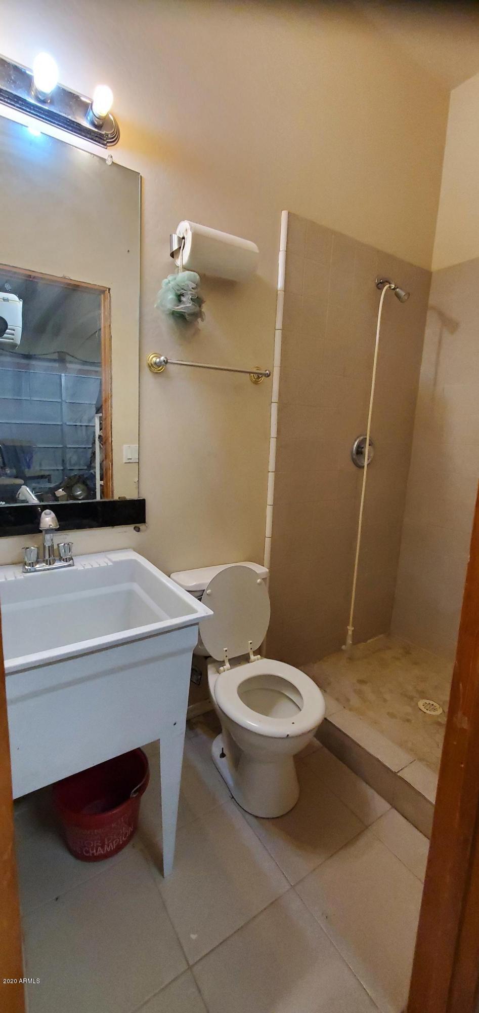 13001 South Tuthill Road Buckeye, AZ 85326 - Photo 21 of 29 Bathroom in Garage