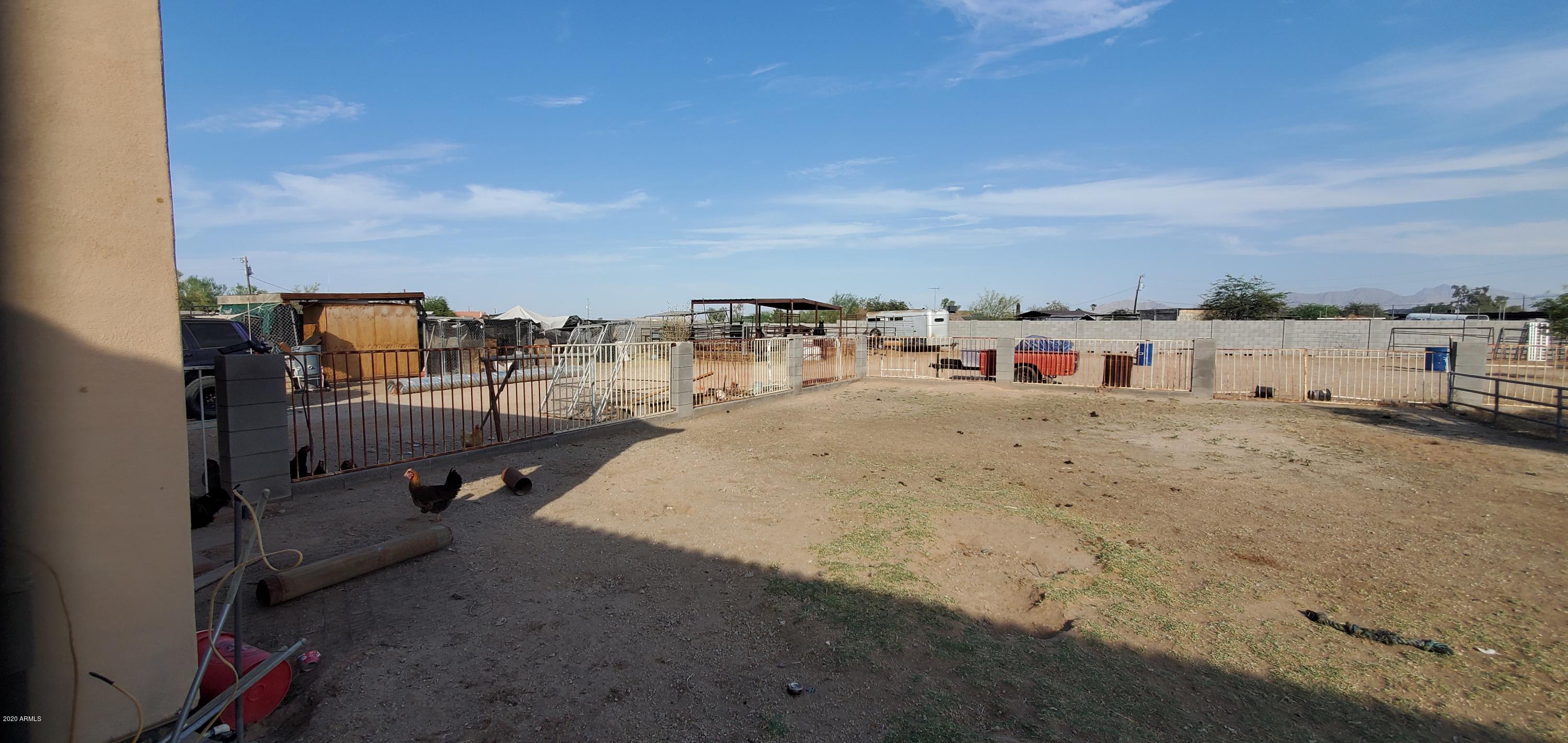 13001 South Tuthill Road Buckeye, AZ 85326 - Photo 24 of 29 Fence and block wall backyard