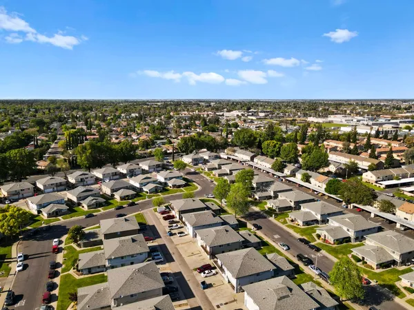 an aerial view of a city with lots of residential buildings