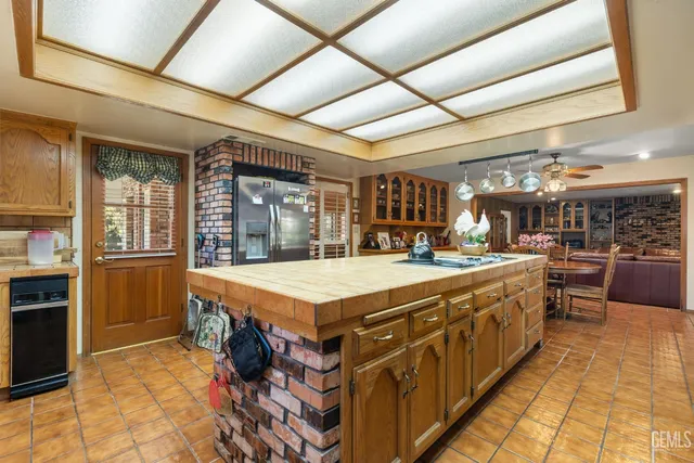 a large spacious bathroom with a large tub and sink