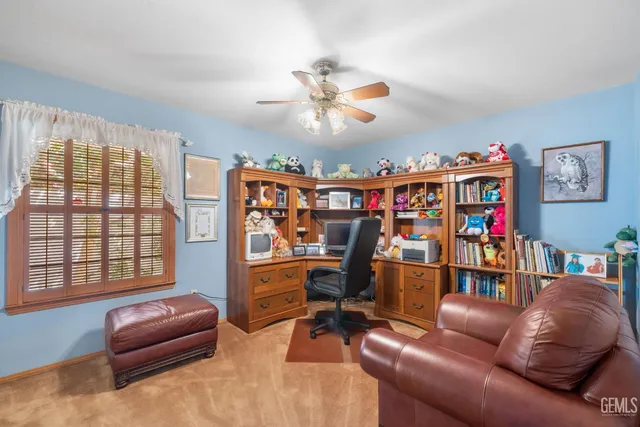 a view of a swimming pool with a yard